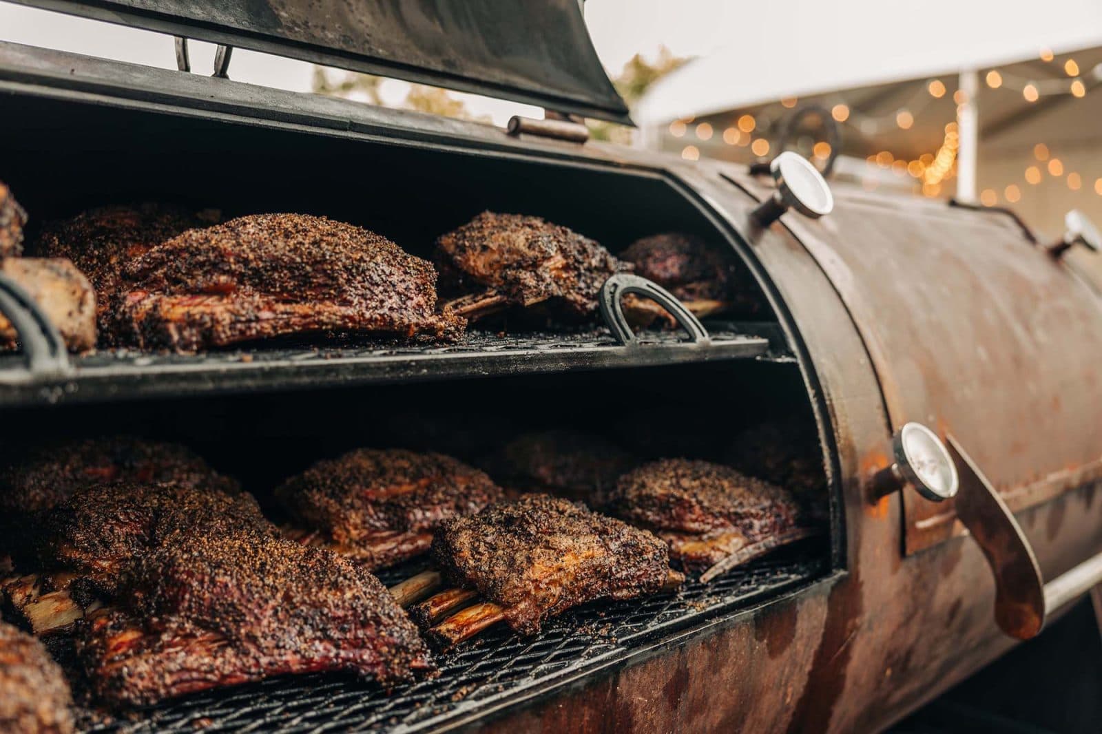 Racks of ribs in a smoker